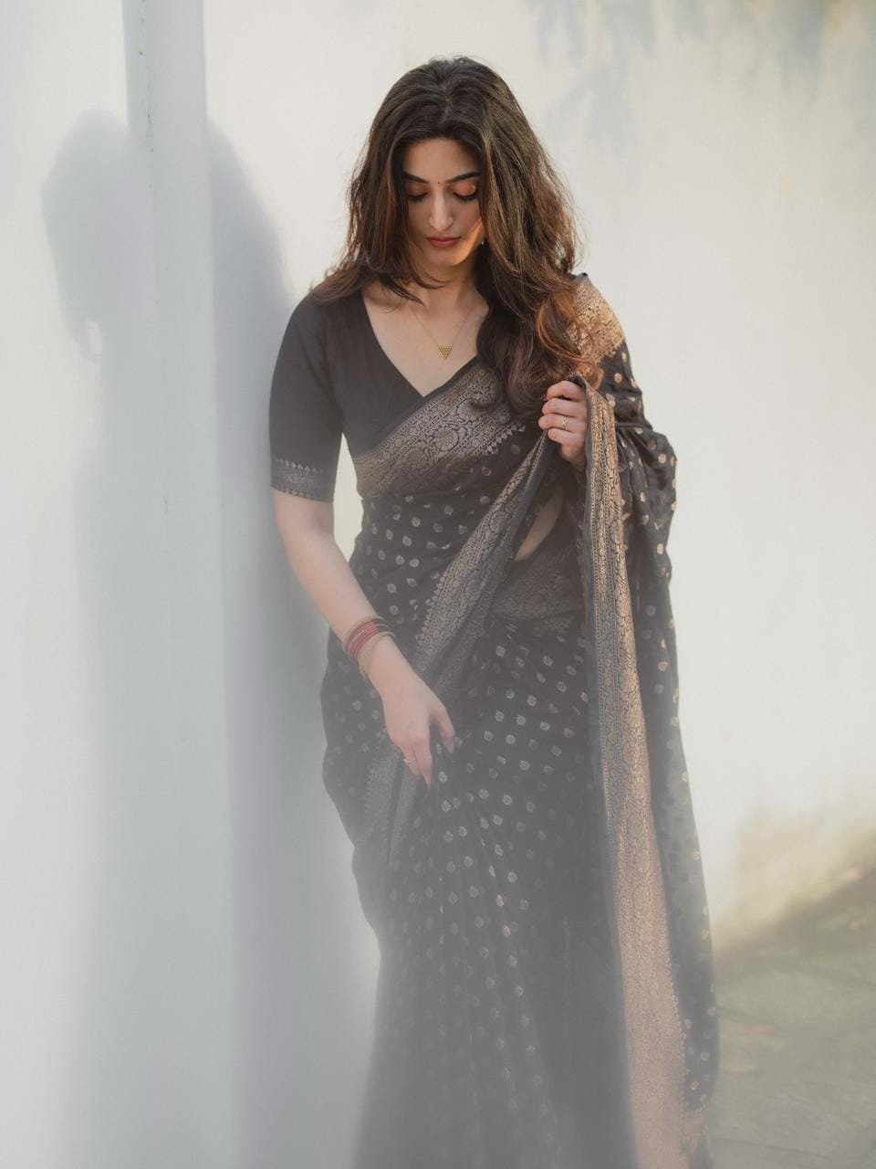 Wommella Black & Gold Printed Saree with Elegant Traditional Border
