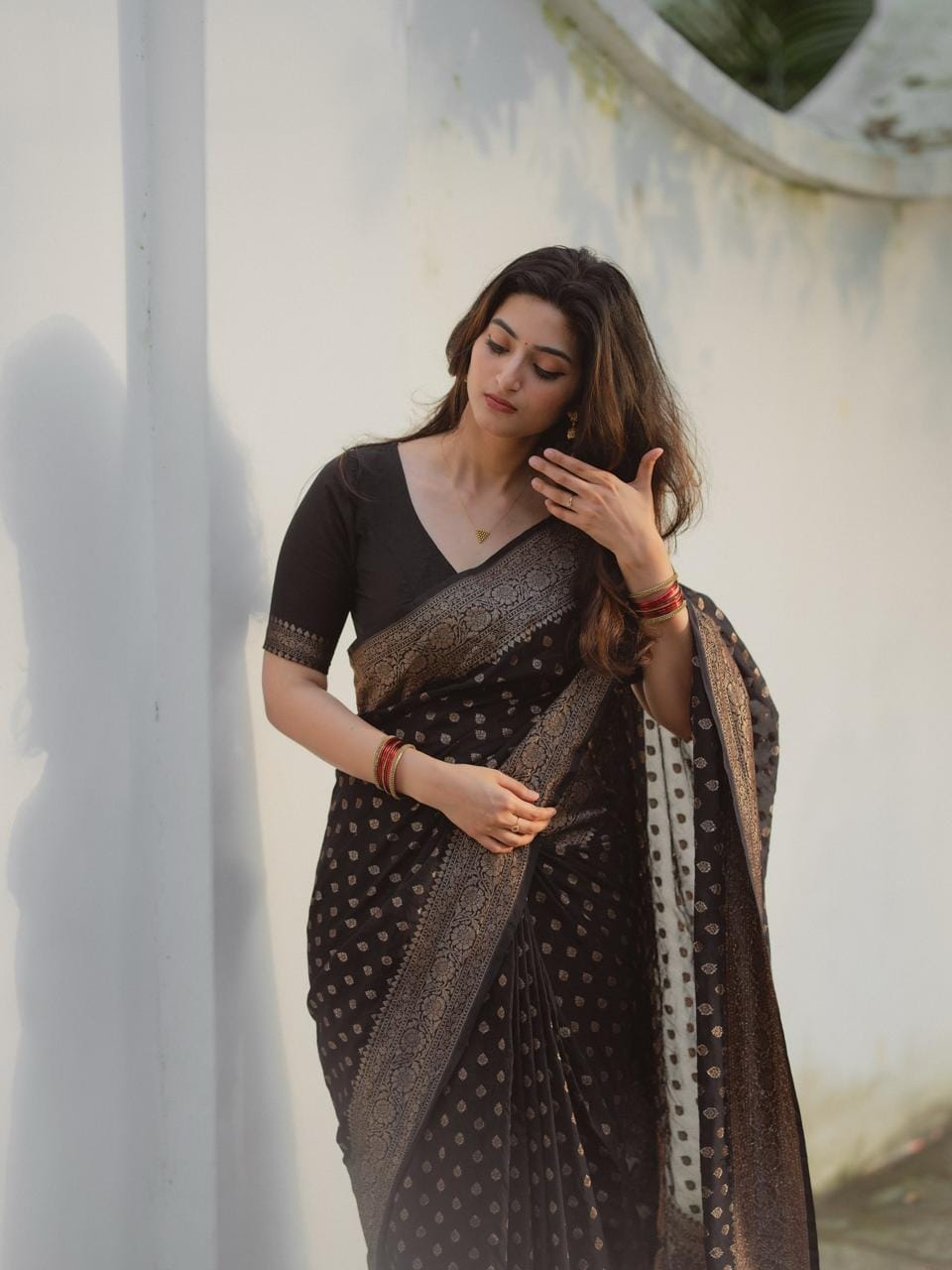 Wommella Black & Gold Printed Saree with Elegant Traditional Border