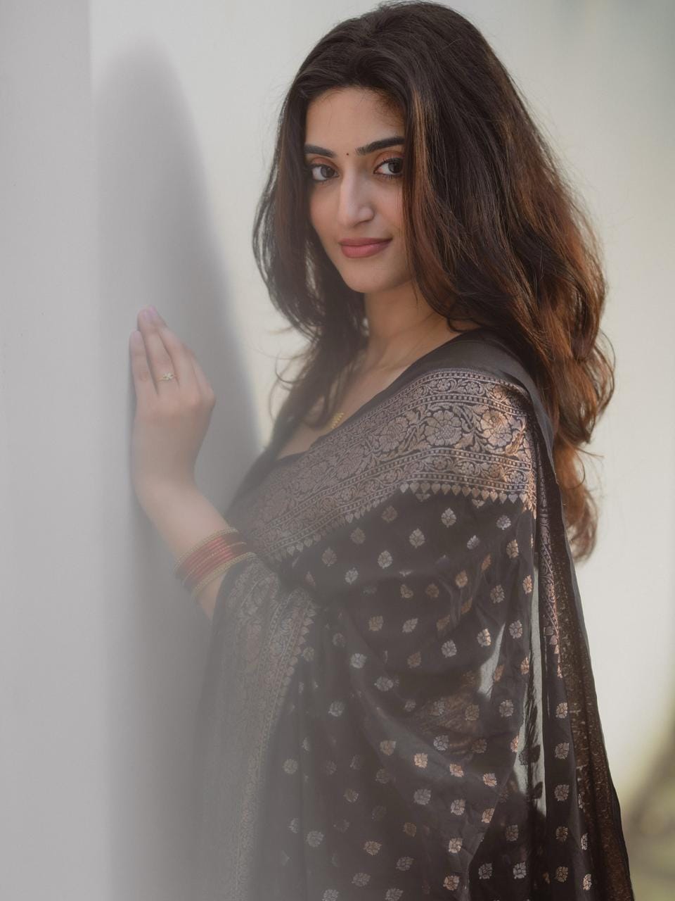 Wommella Black & Gold Printed Saree with Elegant Traditional Border